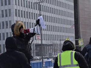 Raina Cook speaks to the crowd at the women's march.