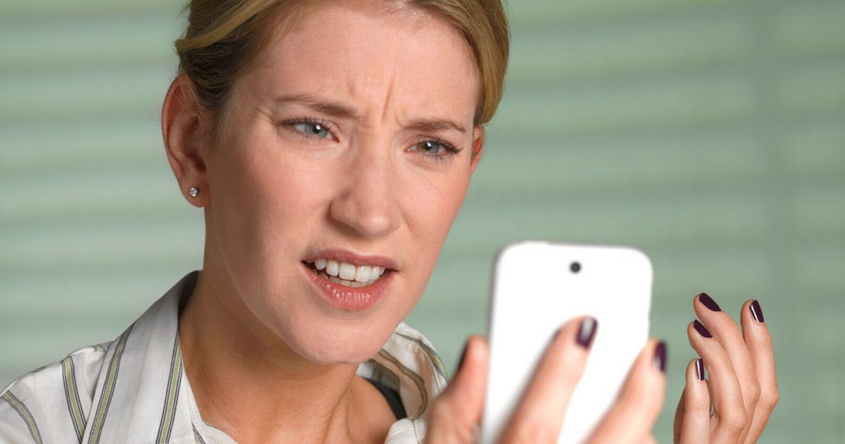 Unhappy-woman-on-smart-phone