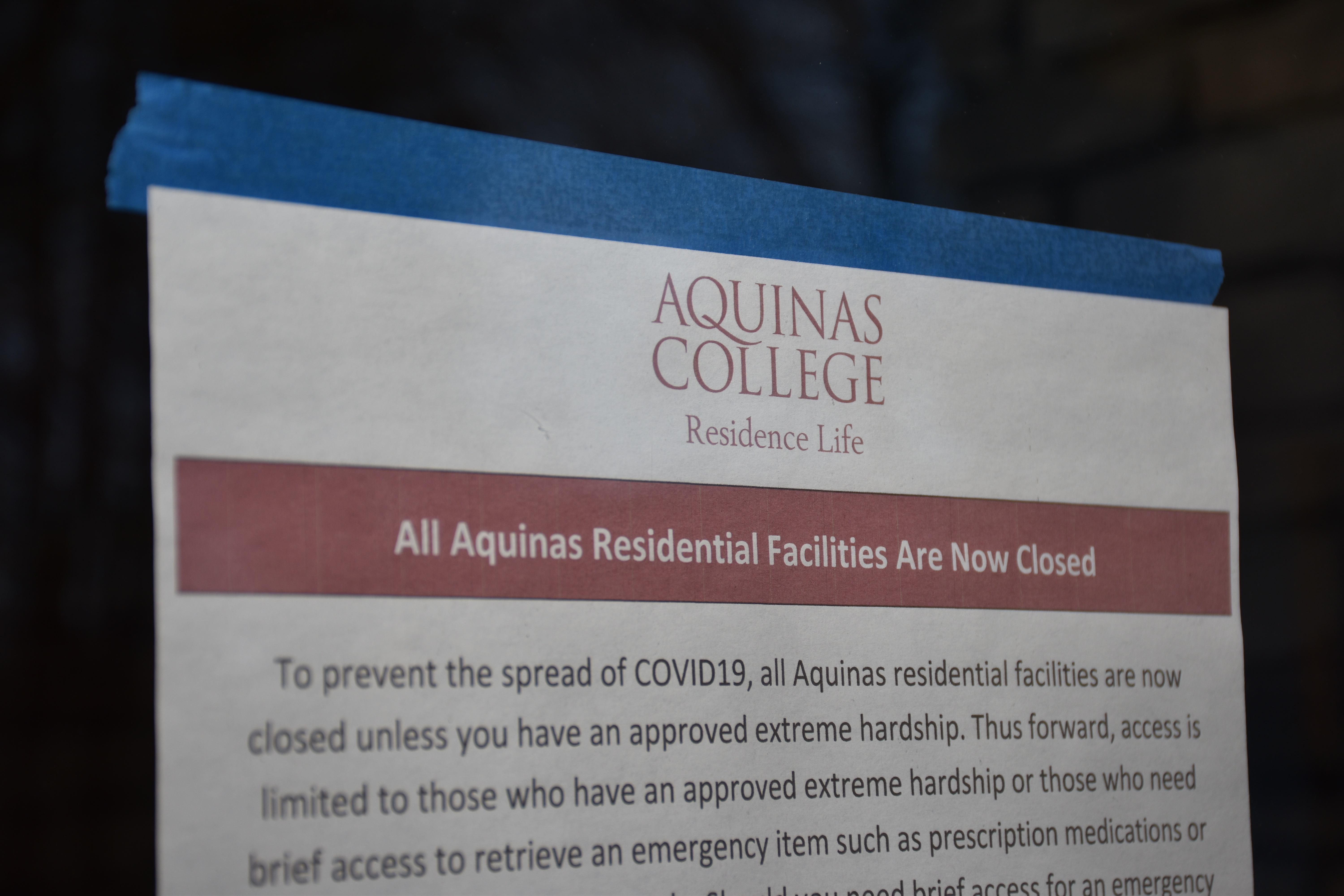 Sign reading "All Aquinas Residential Facilities Are Now Closed"